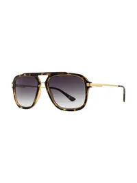 Opium OP-10113 C02 havana acetate double-bridge navigator sunglasses with gold metal temples and grey gradient lenses, three-quarter view on a white background