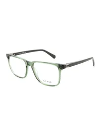 Guess GU50285 square eyeglasses in transparent green (096) with dark green temples, three-quarter view