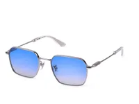 Police SPLN41K sunglasses in silver (579) with blue gradient lenses, front three-quarter view