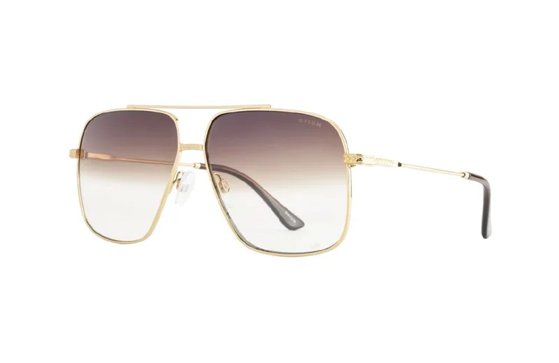 Opium OP-1940 sunglasses in gold with brown gradient lenses, square double-bridge metal frame, front three-quarter view