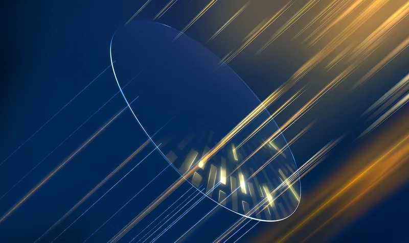 Essilor Varilux Physio extensee Lenses, render of a clear lens with gold light streaks from Essilor's Physio extensee technology imagery