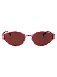 Gucci GG1853S 004 fuchsia sunglasses with red lenses, front view