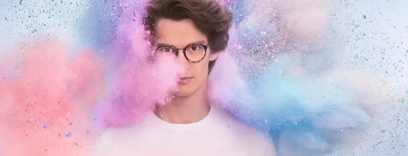 Essilor Crizal FSV BCT Lenses, Essilor Crizal campaign image of a man wearing clear lenses in a pastel colour cloud