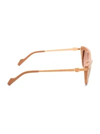 Guess GU00378 rose-gold metal temple with G emblem and beige tip, side profile